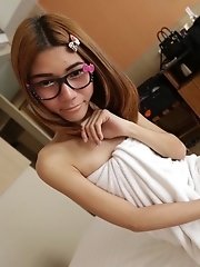 Skinny ladyboy in glasses getting fucked in Bangkok hotel